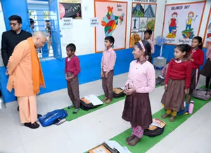Chitrakoot: Uttar Pradesh Chief Minister Yogi Adityanath interacts with children at a primary school