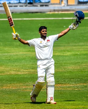 Mumbai: Mumbai's Musheer Khan celebrates his century during the third day of the Ranji Trophy final match between Mumbai and Vidarbha