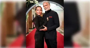 Milind soman with wife post image