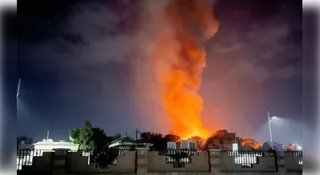 US airstrikes on Yemen fuel port kill 80