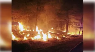 France battles wildfire larger than Paris; one dead as blaze spreads fast