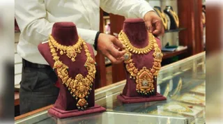 Gold surges to record high as investors flock to safe havens amid global uncertainty