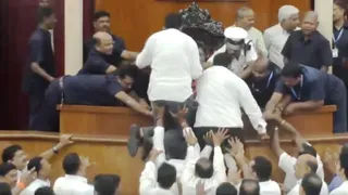 BJD MLAs try to climb atop Speaker's podium in Odisha Assembly