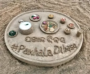 Sudarsan creates sand art on International Pakhala Dibasa in Odisha