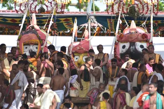 Deities take holy shower on Snana Purnima in Odisha's Puri