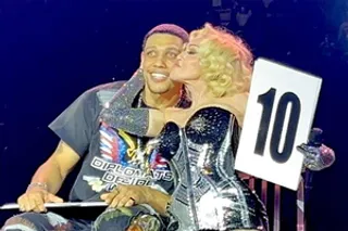 Madonna kisses boyfriend Josh Popper on stage