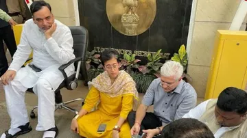 Delhi ministers outside L-G VK Saxena's residence in New Delhi.