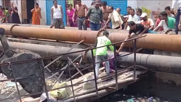 the girl fell and got trapped inside the iron pipe