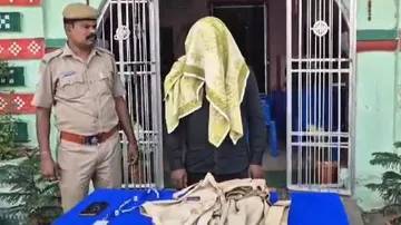 Loot in Police attire
