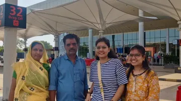 Payal Khatik (2nd from R) and her family