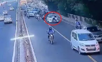 ଗାଡ଼ି ବନେଟ୍ ଉପରେ ଟ୍ରାଫିକ୍ ପୁଲିସଙ୍କୁ ଟାଣି ନେଲେ ଚାଳକ