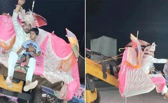 ବୁଲଡୋଜର ଉପରେ ବସି ଆସିଲେ ବର, କଟିଲା ଚାଲାଣ