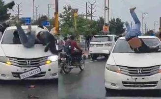 ରାସ୍ତା ମଝିରେ ଚାଲିଥିଲା ମାର୍‌ପିଟ୍‌, ଚଢ଼ିଗଲା କାର୍‌