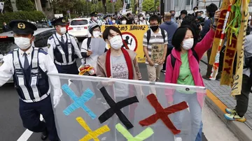 ଟୋକିଓ ଅଲିମ୍ପିକ୍ସ ଷ୍ଟାଡିୟମ ସମ୍ମୁଖରେ ଉତ୍ତେଜନା, ଆୟୋଜନ ବନ୍ଦ କରିବାକୁ ଚେତାବନୀ