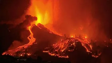Lava pours out of volcano on La Palma in Spain's Canary Islands