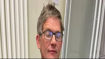 Man eating raw-meat from 50 years