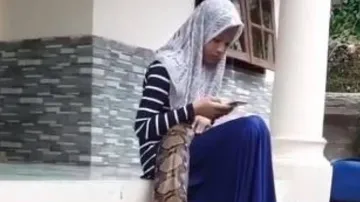 giant python playing with girl