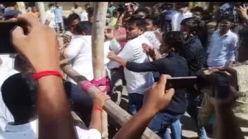 BJP, JMM workers Thrashed 