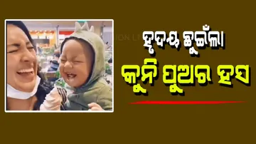 Baby give lovely smile after eating icecream