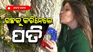 Woman who married tree says they are still happy