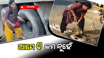 Women mechanics Adilakshmi famous for fixed puncture truck tyre