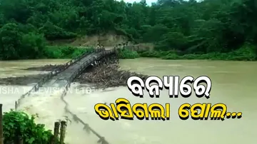 A wooden bridge was washed away by flood waters 