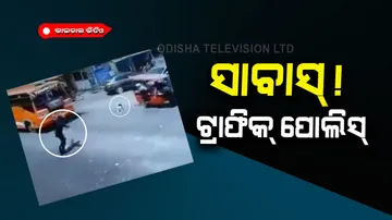 The child was about to come under the bus the traffic police saved