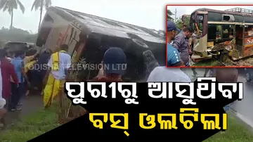 Passenger bus 'Sarala' enroute to Bhubaneswar from Puri overturns