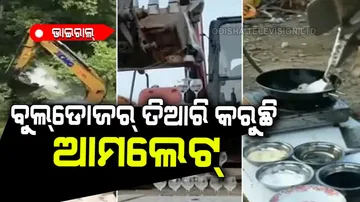 Men doing stunts on bulldozer