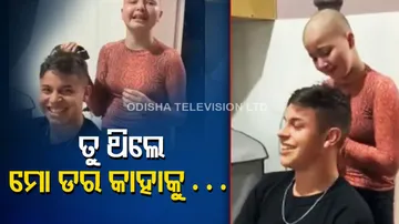 Big brother shaves his head