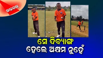 Handicap man playing cricket doing bowling