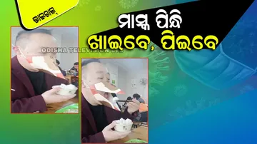 Man uses unique beak shaped face mask