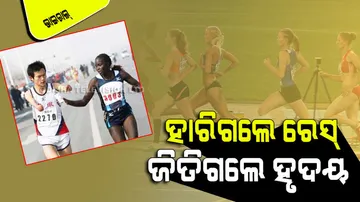 Kenyan Athlete Jacqueline Nyatipei Helping Disabled Co-Athlete To Drink Water