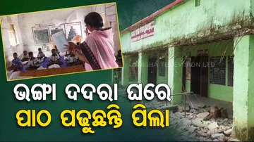 Students read in dilapidated school