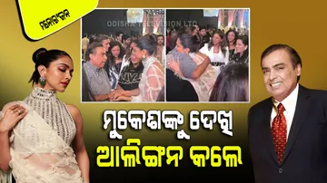 Deepika Padukone gives mukesh ambani a worm hug at manish malhotras fashion show
