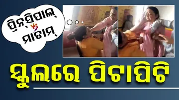 Principal, teacher attack each other