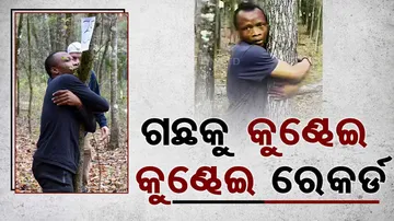 Man from Ghana hugs over 1000 trees