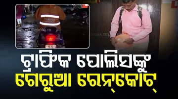 Orange Raincoats For Odisha Traffic Police Officers