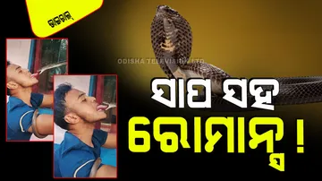 Man Puts His Tongue Inside The Snake Mouth