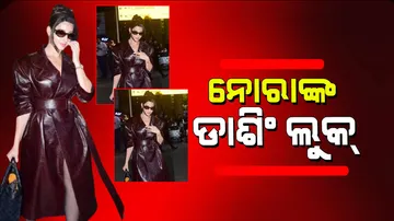 Nora fatehi spotted at airport flaunt sizzling look leather dress