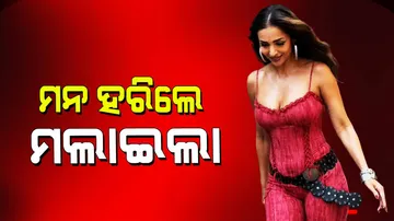 Malaika arora flaunts her curvy figure in a deep neck jumpsuit