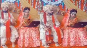 କନ୍ୟା ଲାପଟପ୍‌ ଧରି ଅଫିସ୍ କାମରେ ବ୍ୟସ୍ତ, ପାଖରେ ବୋର୍ ହେଉଛି ବର: ଭିଡିଓ ଭାଇରାଲ୍