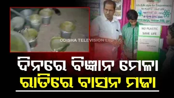 Students wash utensils in puri