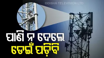 Youth climbs atop mobile tower 