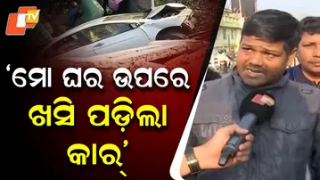 Car Crashes Off Shishu Bhavan Overbridge, Lands on House Roof — Driver Survives