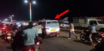 Ambulance gets stuck in heavy traffic