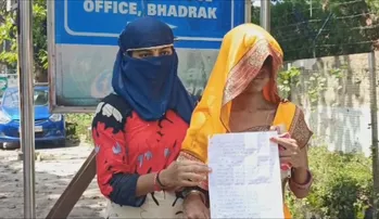 The two victim woman approach Bhadrak SP