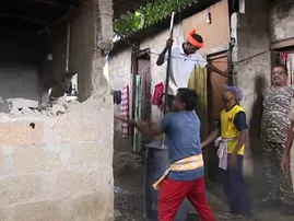 Odisha Excise department runs bulldozers on illegal country liquor unit in Bhubaneswar