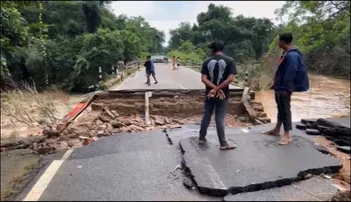 BRIDGE WASHED AWAY