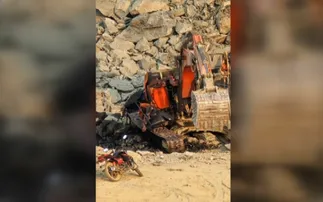 Poclain machine plunges from quarry during illegal stone transport in Balasore